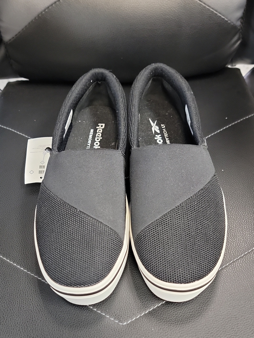 Reebok Women’s Black Slip-On Loafers with White Trim